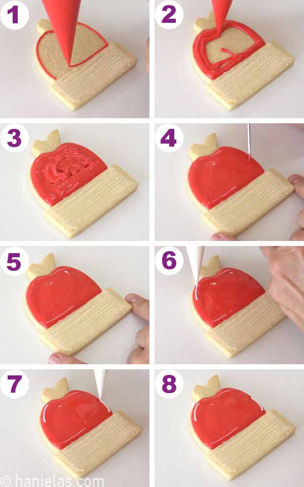 Outlining and flooding a cookie with red icing.