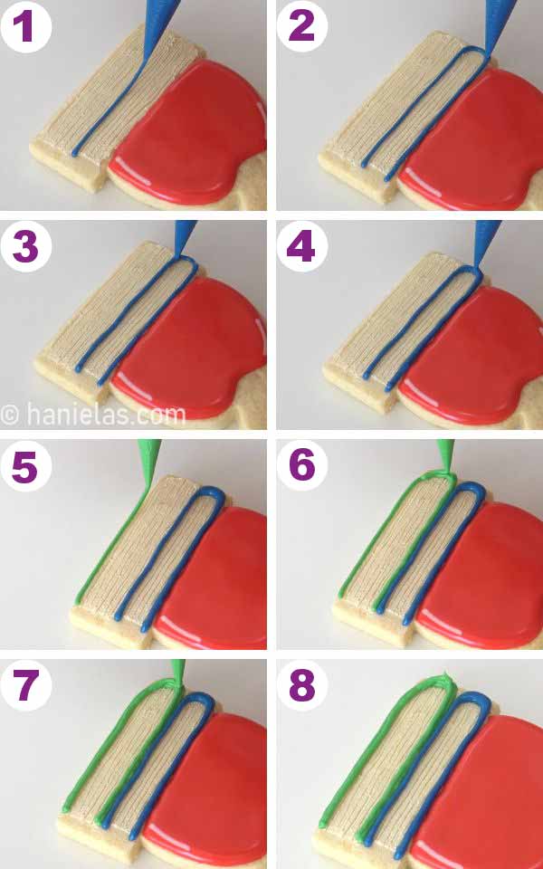 Piping blue and green book cover onto the cookie.