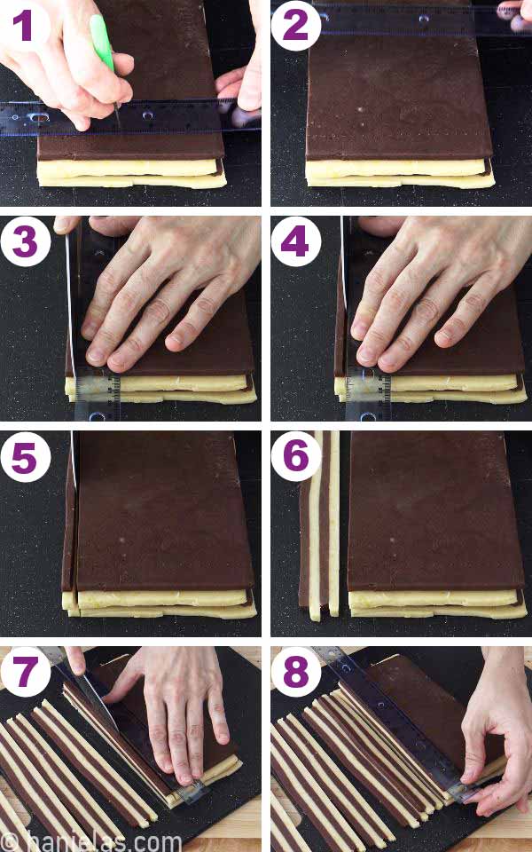 Cutting layers of colored cookie dough into slices.