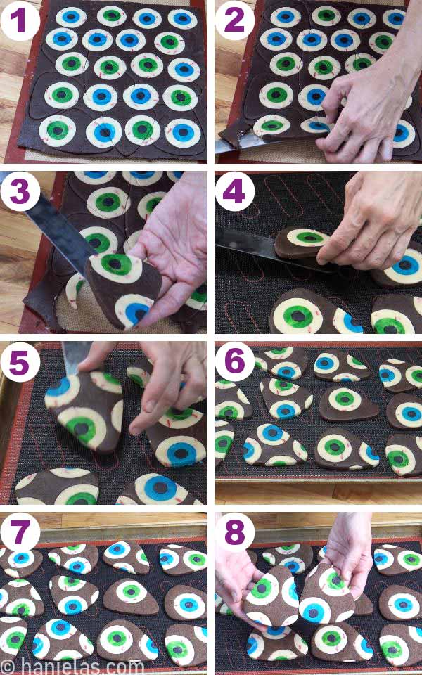 Cut out cookies with eye pattern on a baking sheet.