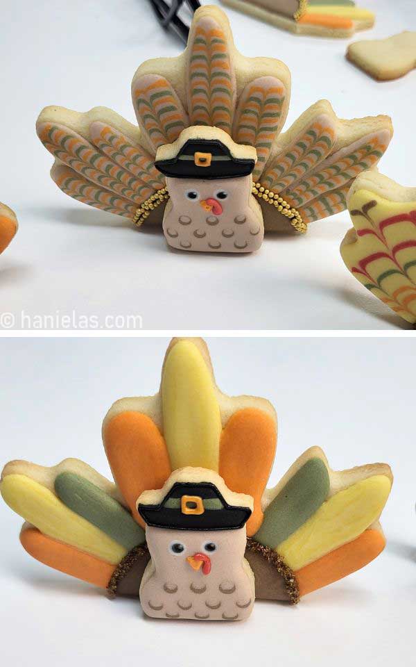 A close up of two cookies standing upright.