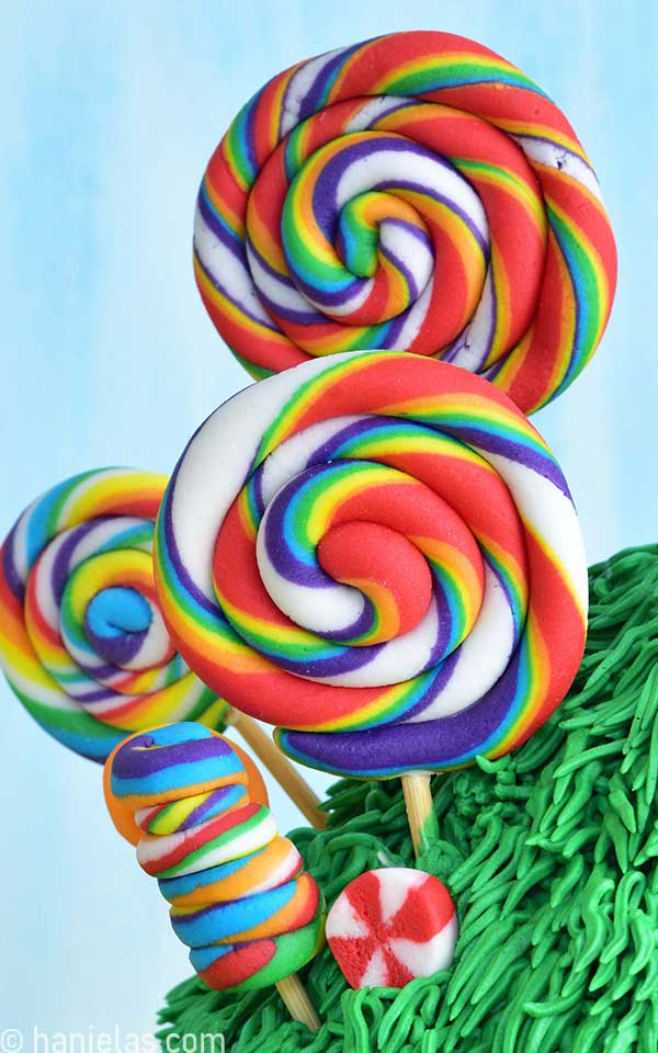 Rainbow lollipops from edible clay.