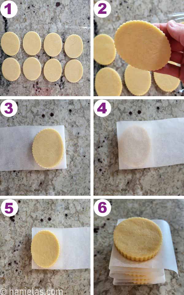 Cookies layered between parchment.